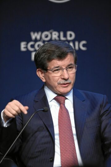 Mahnwache vor dem Bundeskanzleramt: Merkel soll Davutoglu drängen, Islamisten in Syrien nicht mehr zu unterstützen und Hilfe für Kurden und Christen zuzulassen!
